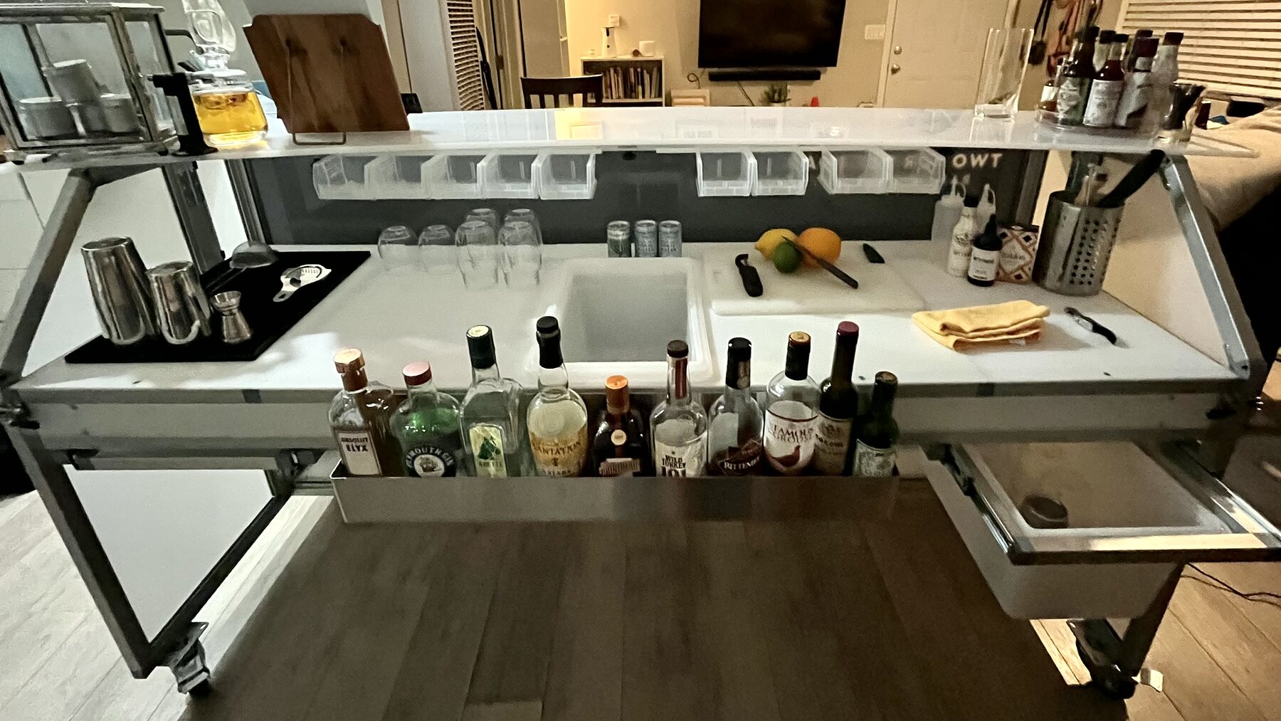 Mobile bar with rinser and running water setup.