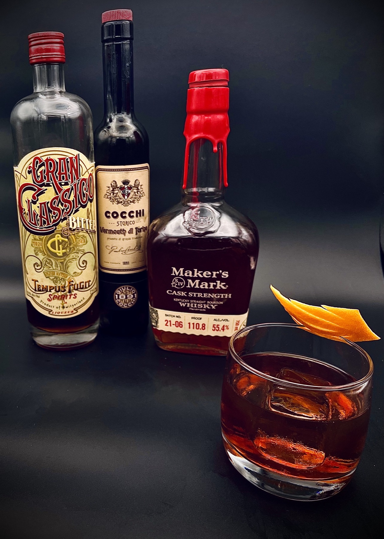 Cocktail bar setup with bottles, tools, and polished service details