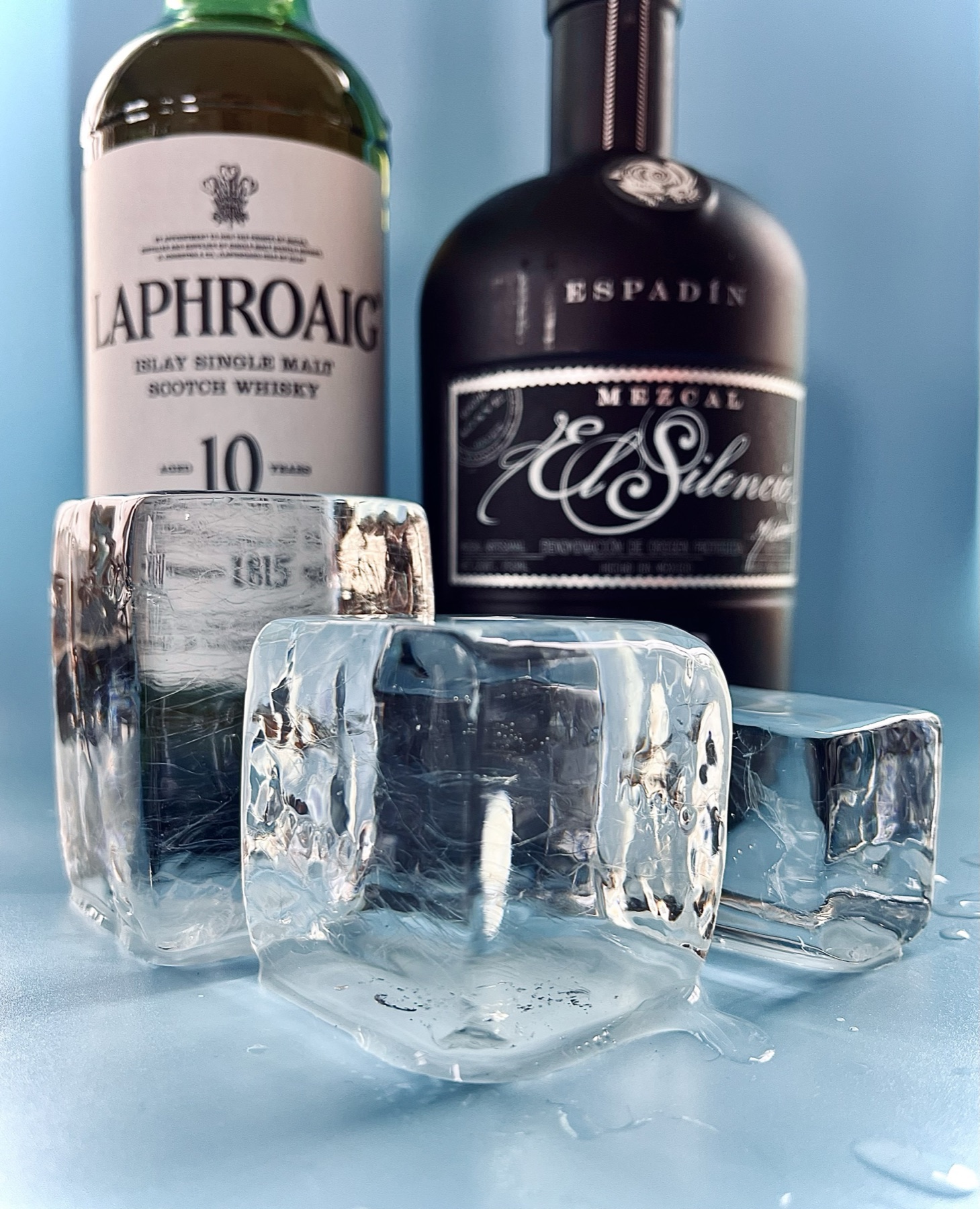 Premium clear ice and spirits prepared for Full Proof cocktail service